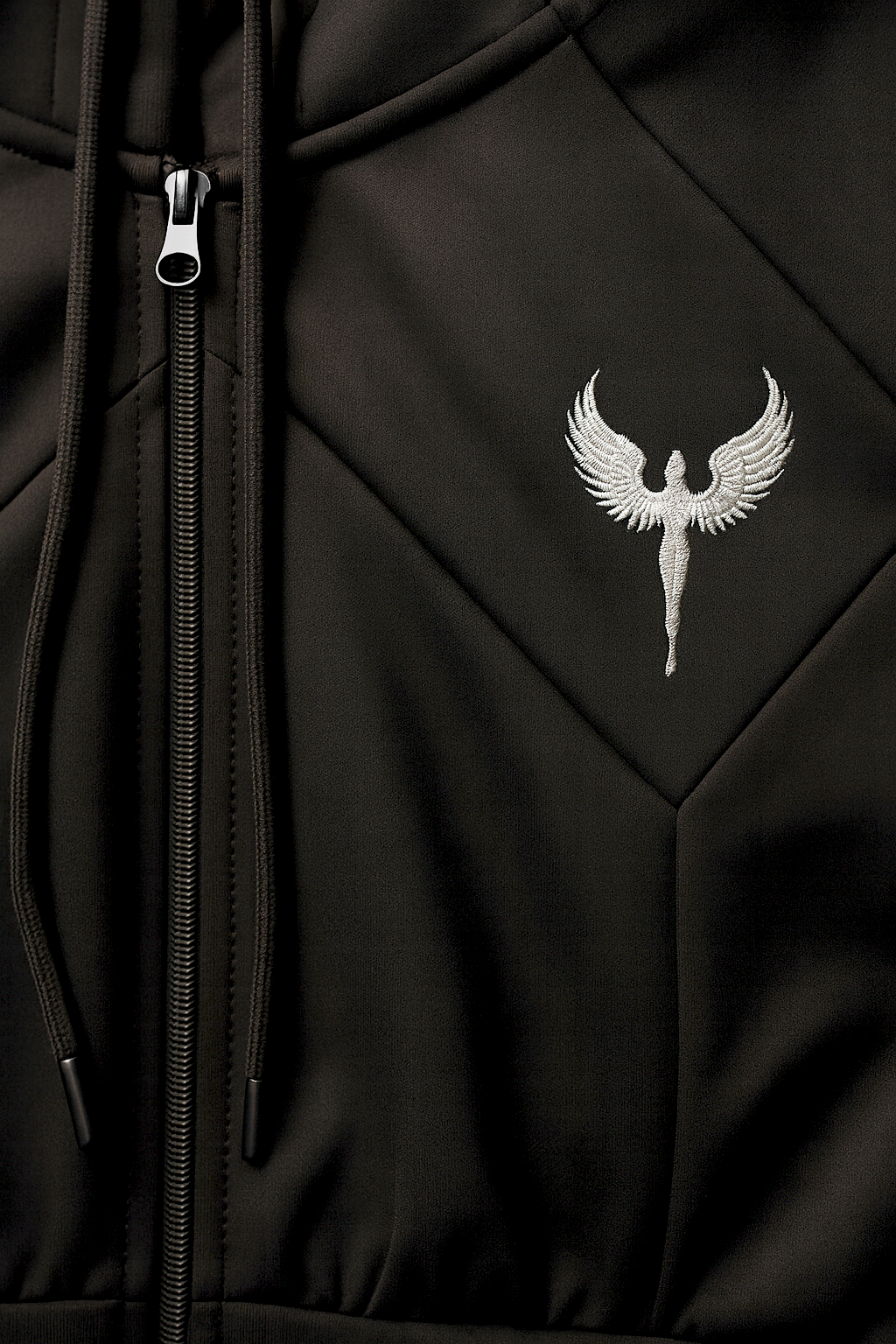 Logo brodé, assemblage design, cordon de serrage et zip de qualité 