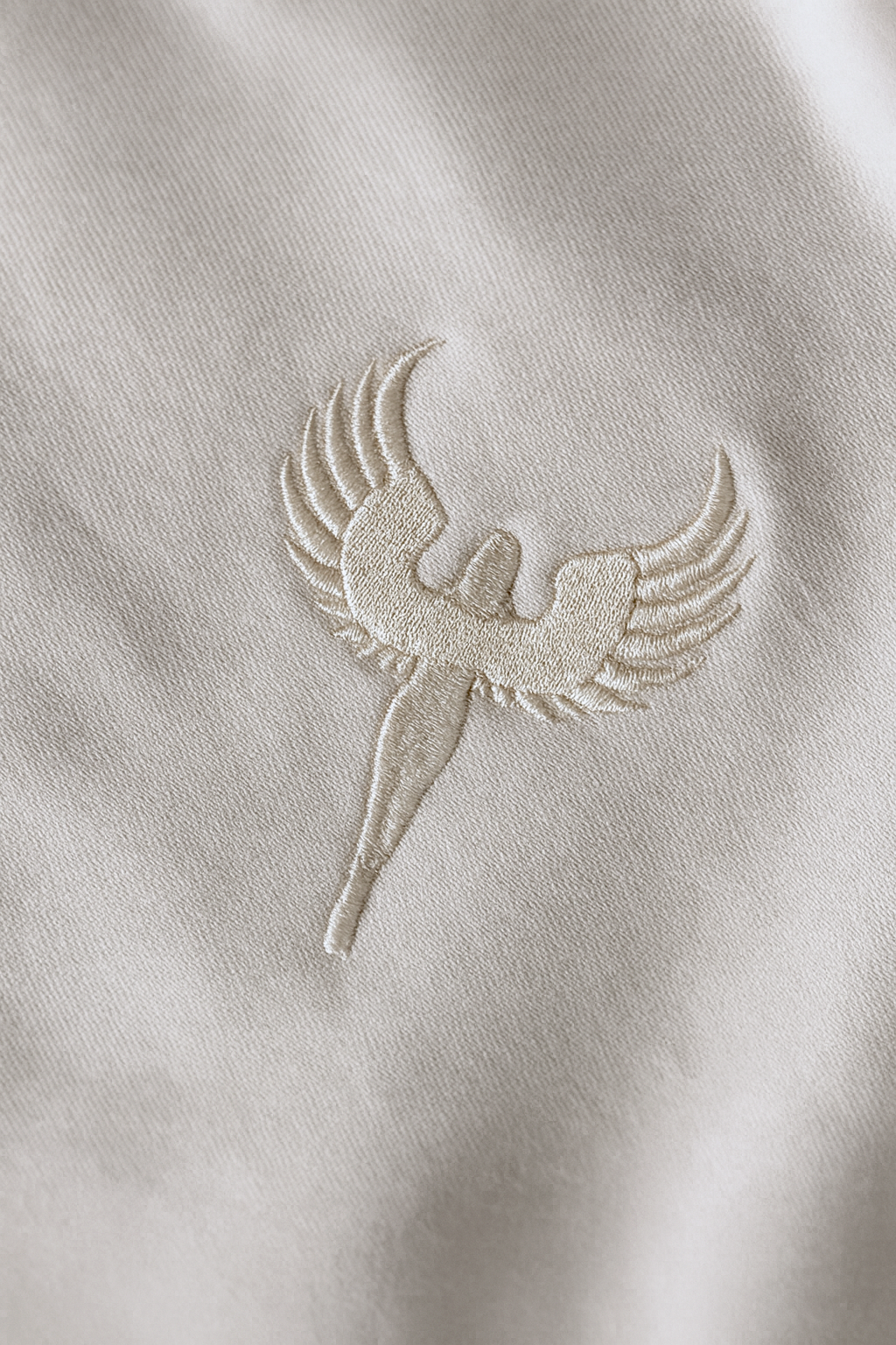 Pull molletonné crème avec logo et nom DAITENSHI brodé.